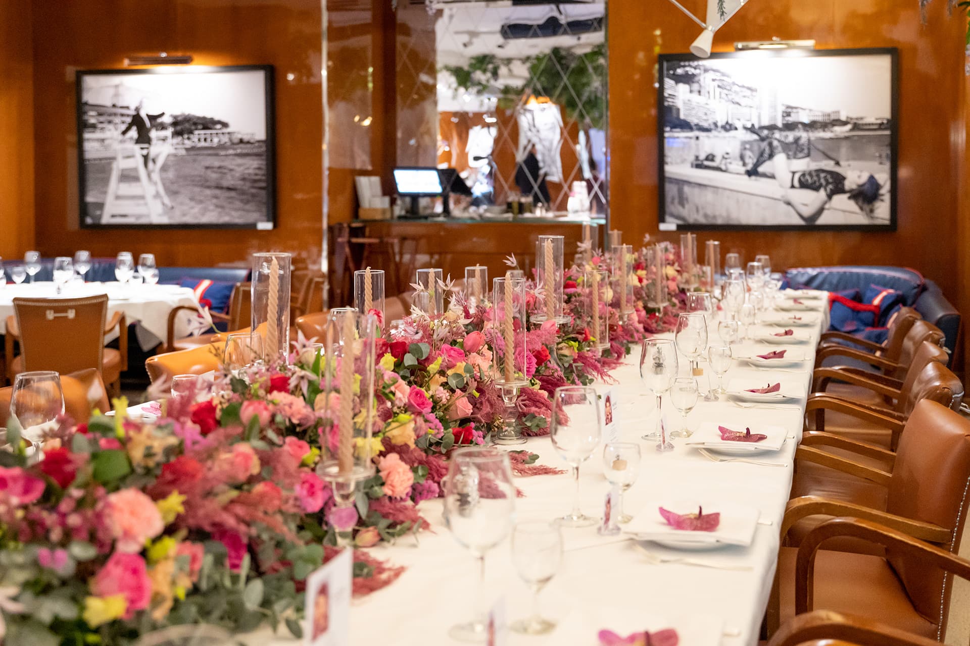 Cipriani Monte-Carlo's wood-panelled room, a flower-dressed table
