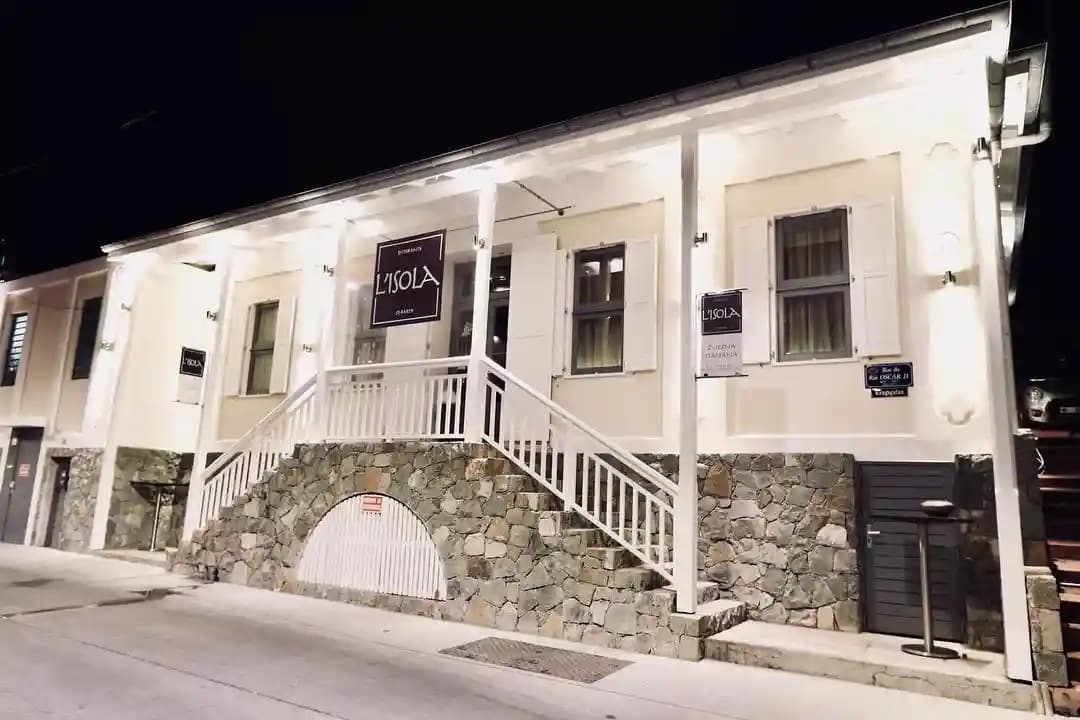 L'Isola's illuminated facade on Rue du Roi Oscar II, Gustavia