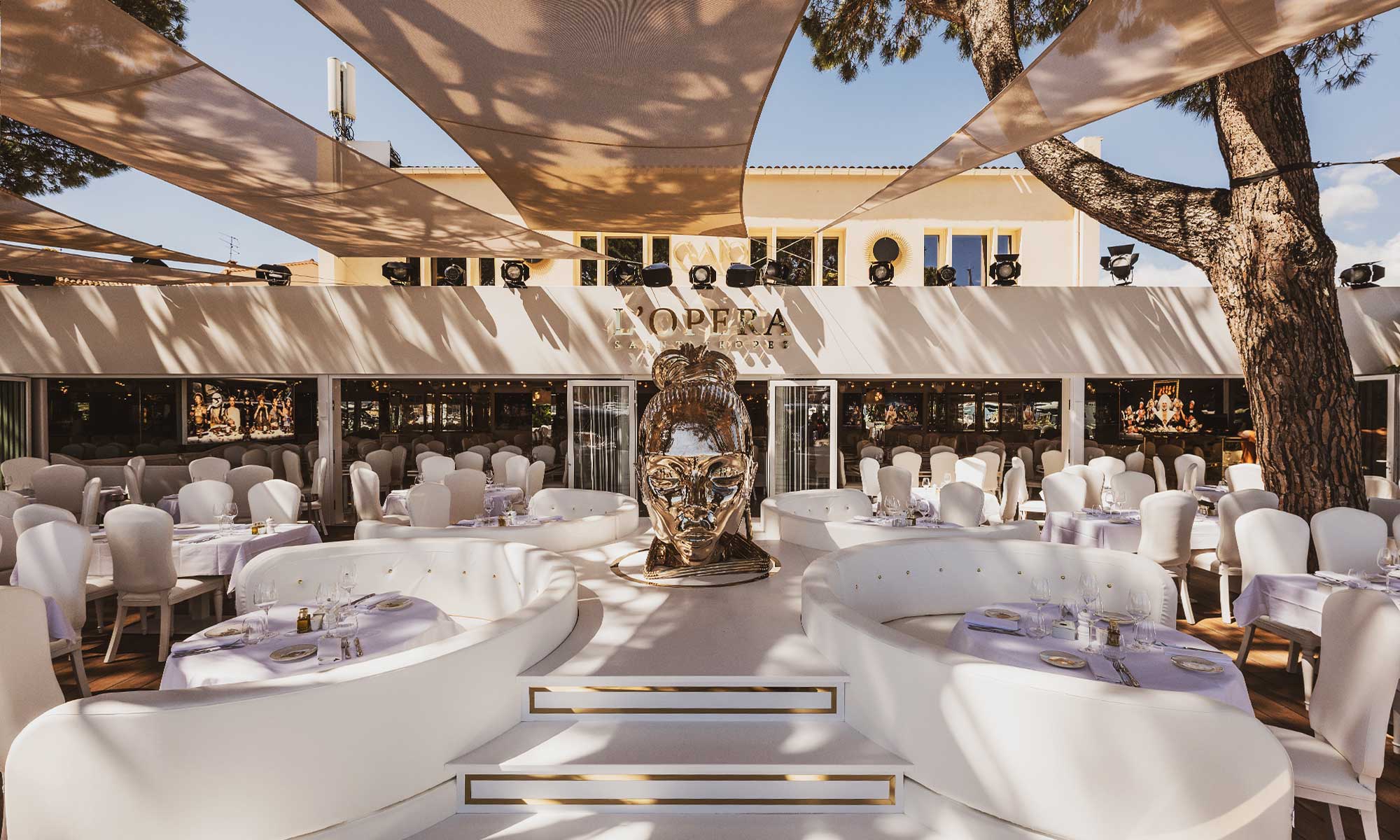 L'Opéra's terrace and its golden sculpture, facing the port